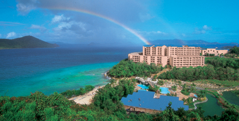 Aerial view of bay and rainbow